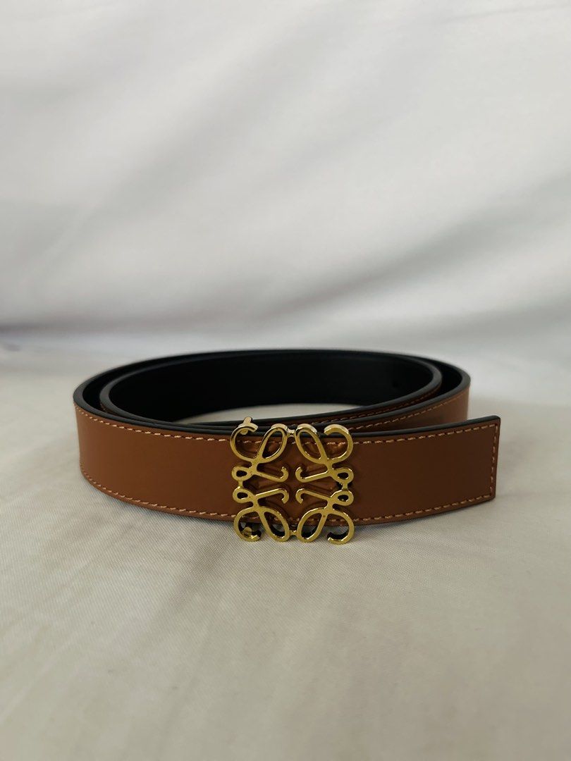 Authentic Loewe Reversible Anagram Leather Belt (Category: Belts) located in Quezon City. Submitted by carmi.md (Listing ID 1459524502, Image 2). Description: - Authentic Loewe Reversible Anagram belt in smooth calfskin bought from Shangri-la mall - Color: Tan / Black - Buckle: Gold Anagram - Size: 80 / 32 , 2.8cm wide - No defects, no creases, no stains - Inclusions: Original Box, Dust Bag, Authenticity Card, Original Paper bag RFS: Decluttering