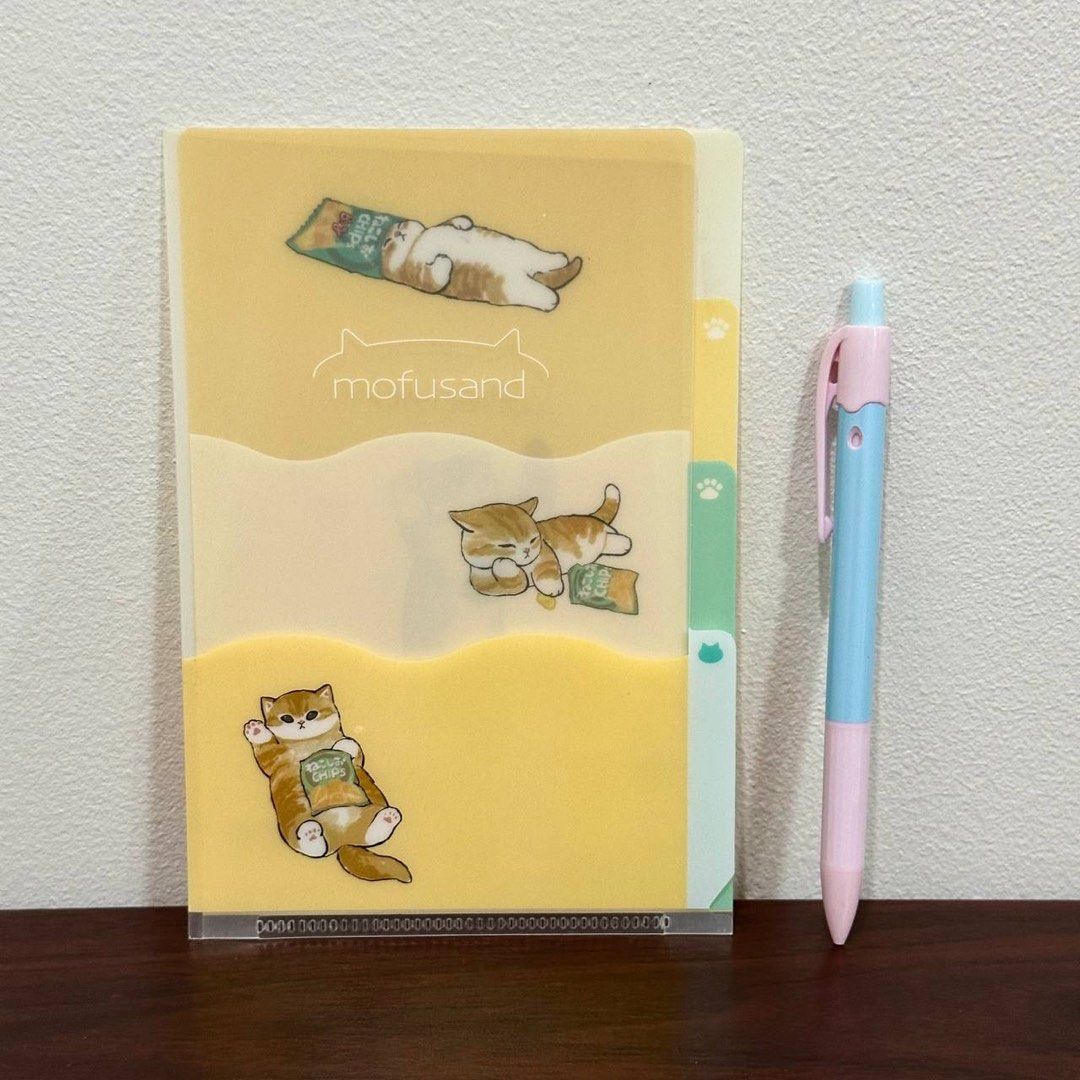 [Authentic] Mofusand Mini A6 File Folder (Category: Stationery & School Supplies) located in Quezon City. Submitted by brandedusagoodies (Listing ID 1459645019, Image 2). Description: Authentic mofusand A6 file folder featuring cute cat designs. Perfect for organizing documents, receipts, notes, and other small papers. Design • Pink Cat Design • Yellow Cat Design Size • 12 × 17.5 cm • A6 Size Features • Cute mofusand cat design • Lightweight and 