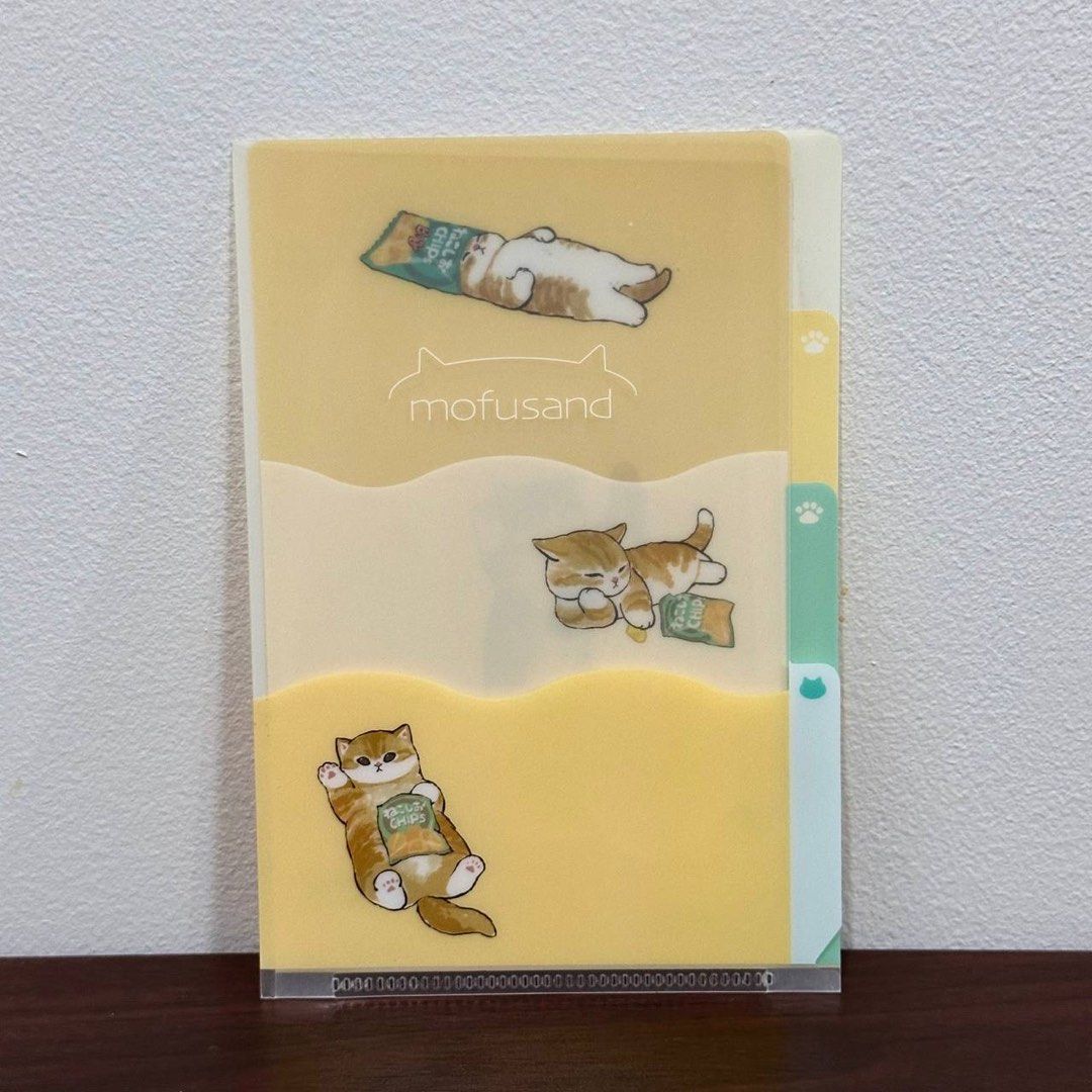 [Authentic] Mofusand Mini A6 File Folder (Category: Stationery & School Supplies) located in Quezon City. Submitted by brandedusagoodies (Listing ID 1459645019, Image 3). Description: Authentic mofusand A6 file folder featuring cute cat designs. Perfect for organizing documents, receipts, notes, and other small papers. Design • Pink Cat Design • Yellow Cat Design Size • 12 × 17.5 cm • A6 Size Features • Cute mofusand cat design • Lightweight and 