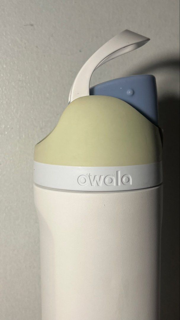 AUTHENTIC Owala FreeSip 24oz Iced Breeze (Category: Beverages) located in Taguig. Submitted by cccsophia (Listing ID 1459635290, Image 2). Description: Iced Breeze Owala FreeSip 24oz 🎄 Used; With imperfections (see pic), hence the price 🎄 Free mint green boot & metal straw 🎄 Major dent not visible with boot 🎄Missing silicon part at the top (Replaceable) 🎄 MOD: SDD.