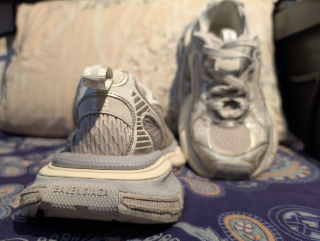 B alenciaga 3xl (Category: Sneakers) located in Imus. Submitted by kmoort (Listing ID 1459507123, Image 3). Description: -This is a pair of B alenciaga 3XL sneakers in a light beige colorway featuring the signature size 38 embroidered on the toe. - Size: 38 - Colorway: Light Grey & Metallic Silver - Features: Iconic chunky sole design - Style: Statement piece, perfect for adding edge to your look pls set your expectations the item is selected thr
