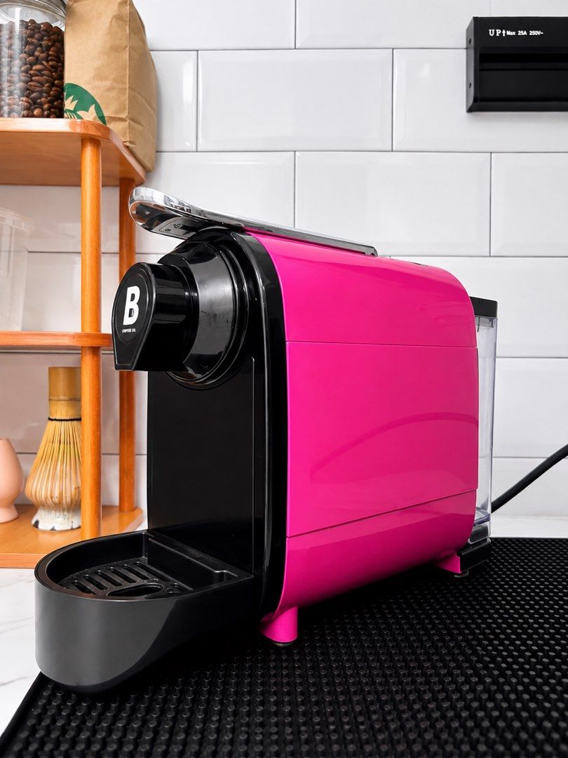B Coffee Co. Pink Freshman (Category: Coffee Machines & Makers) located in Manila. Submitted by mikamala (Listing ID 1459554529, Image 3). Description: - B Coffee Co. Freshman coffee machine in a stylish pink color. - Perfect for making lattes and other coffee beverages. - Compact and attractive design for any kitchen counter. FEATURES - 20 Bar brewing pressure - Programmable cup size - One-touch control buttons for single cup size of choice - Ra