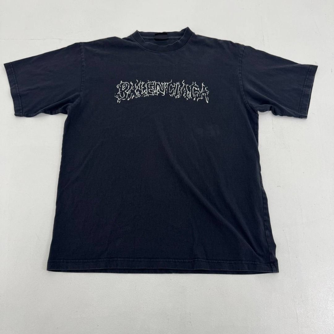 Balenciaga Metal outline logo tee (Category: Luxury Apparel) located in Quezon City. Submitted by johnpaulperezzz (Listing ID 1459547736, Image 1). Description: NAME: Balenciaga Metal outline logo tee COLOR: Black SIZE: Small on tag FIT: Large Dimension: Width: 23 Length: 30 Shoulder: 21 Sleeves: 9 Hem: 23 CONDITION: 8/10 ISSUE: -sweat stain at the back PRICE: 9k .