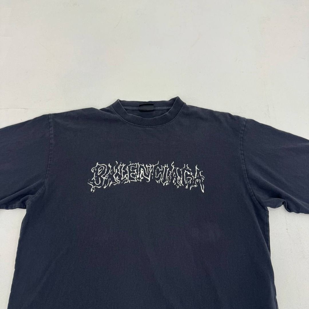 Balenciaga Metal outline logo tee (Category: Luxury Apparel) located in Quezon City. Submitted by johnpaulperezzz (Listing ID 1459547736, Image 2). Description: NAME: Balenciaga Metal outline logo tee COLOR: Black SIZE: Small on tag FIT: Large Dimension: Width: 23 Length: 30 Shoulder: 21 Sleeves: 9 Hem: 23 CONDITION: 8/10 ISSUE: -sweat stain at the back PRICE: 9k .
