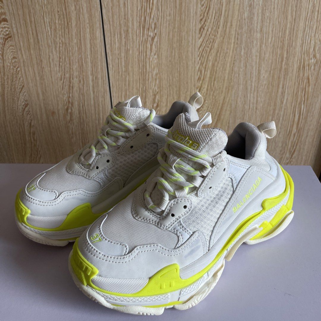 Balenciaga Triple S Sneakers (Category: Sneakers) located in Cebu City. Submitted by lequiaabanid (Listing ID 1459642473, Image 3). Description: BALENCIAGA TRIPLE S – WHITE/NEON YELLOW Preloved Balenciaga Triple S 💚 ✨ Good condition & well maintained ✨ Lightly used and still in great shape ✨ Minor stain/signs of usage on the side (please see photos) ✨ Perfect for casual, streetwear and everyday outfits 📸 More pictures are available upon request