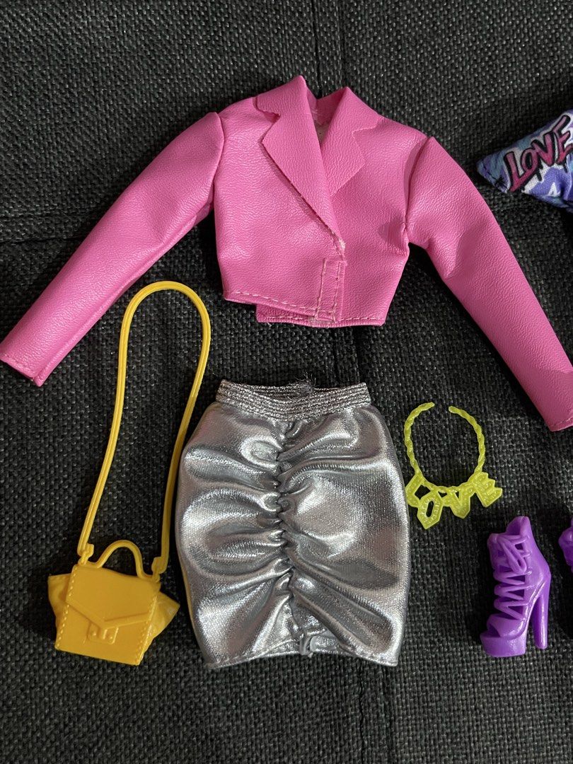 Barbie Clothes Set (Category: Kids Toys) located in Manila. Submitted by mikeeshop_61 (Listing ID 1459579947, Image 2). Description: Barbie Clothes/Fashion Set As is. Payment First MOP: Gcash MOD: J&T/Lalamove.