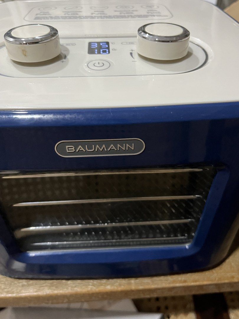 BAUMANN Food Dehydrator 8L Capacity (Category: Other Kitchen Appliances) located in Pasig City. Submitted by tylernchloe (Listing ID 1459542833, Image 3). Description: - Model # BM-TA2000ABCB - Adjustable timer and temp control - Four drawer-style mesh drying trays - Compact and space-saving design - Comes with instruction manual - Used once; rfs: need a bigger one..
