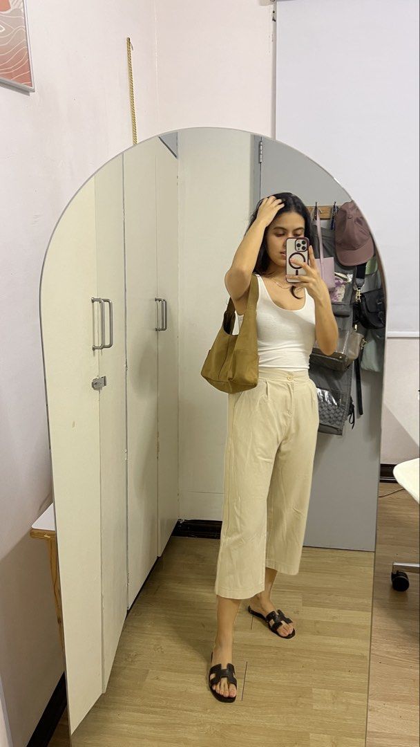 Beige Linen Culottes Wide Leg Pants (Category: Other Bottoms) located in Manila. Submitted by nplooma (Listing ID 1459668408, Image 1). Description: - Beige high-waisted culottes - Wide leg, cropped fit - Functional side pockets - Button and zip closure - Comfortable and versatile for casual outfits - Easy to pair with tops and sandals.