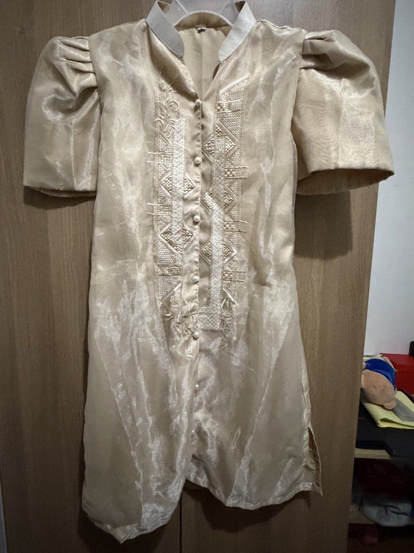 Beige/Cream-colored Filipiniana (Category: Traditional & Ethnic wear) located in Quezon City. Submitted by jianmorata89759 (Listing ID 1459620045, Image 1). Description: - Short puff sleeves - Intricate embroidery on the front - Pearl button closure - Light beige collar - Estimated size: Large but was resized to fit medium - small size - Ideal for formal events and cultural celebrations - Length: ~ 38 in - Waist : ~36 in RFS: Bought for graduatio