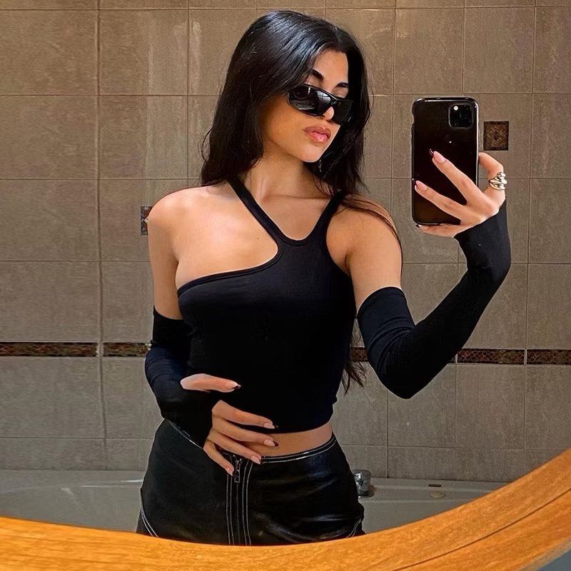 Black Asymmetrical Crop Top with Sleevelets (Category: Others Tops) located in Quezon City. Submitted by e182885da6246a5b75aac67add07a3 (Listing ID 1459608253, Image 2). Description: - Cool black crop top - Asymmetrical neckline - Includes matching sleevelets - Versatile for night out or stylish casual looks - Stretchy material for ultimate comfort - Great fit 📍Project 7, QC 🚚 Shipping shouldered by buyer.