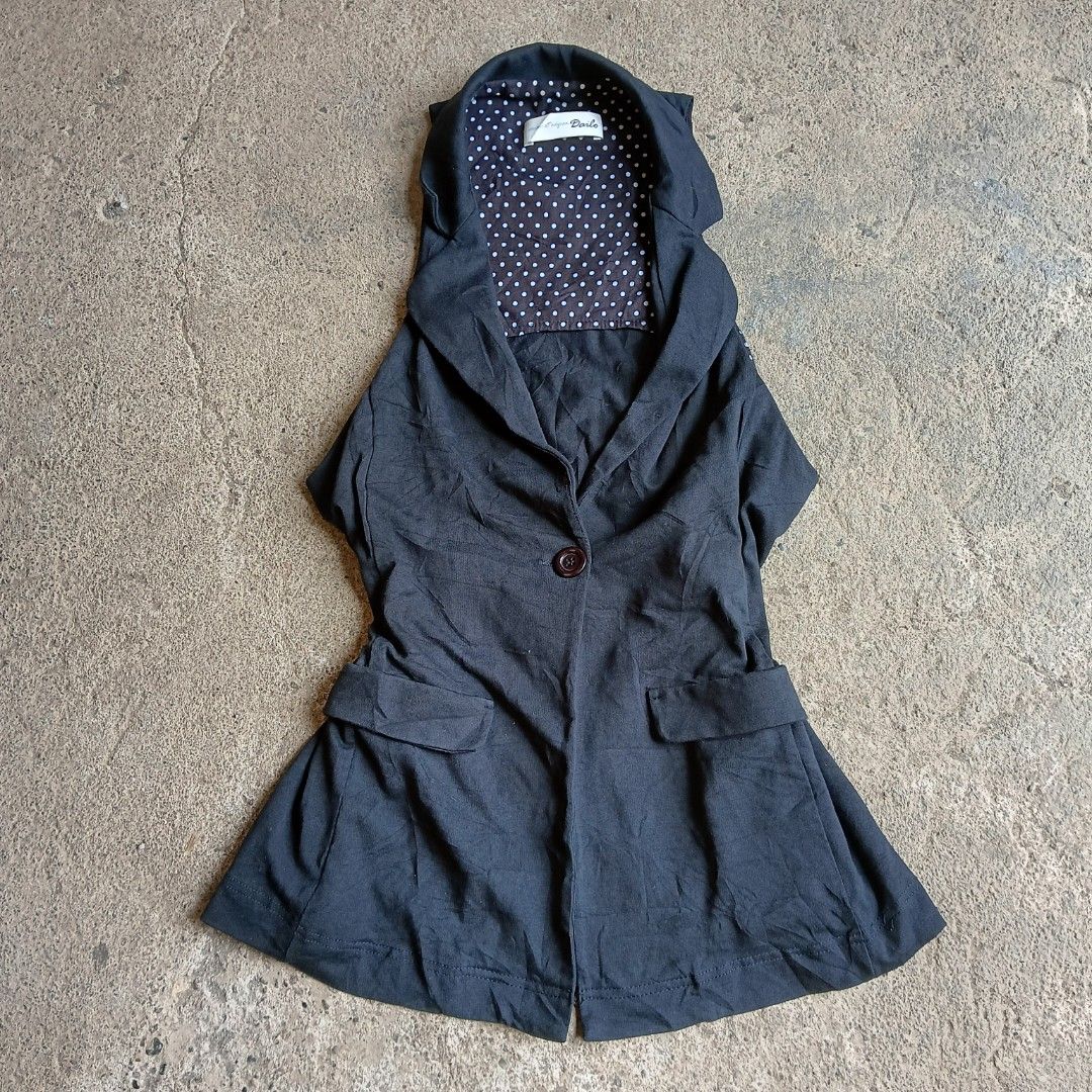 Black Blazer Vest with Polka Dot Lining (Category: Coats, Jackets and Outerwear) located in Davao. Submitted by calli_2219 (Listing ID 1459613336, Image 1). Description: - Sleeveless black blazer vest - Single button closure - Two front pockets - Inner lining with cute white polka dot pattern - Ideal for layering over tops - Creates a sharp and stylish look Size: M-L.