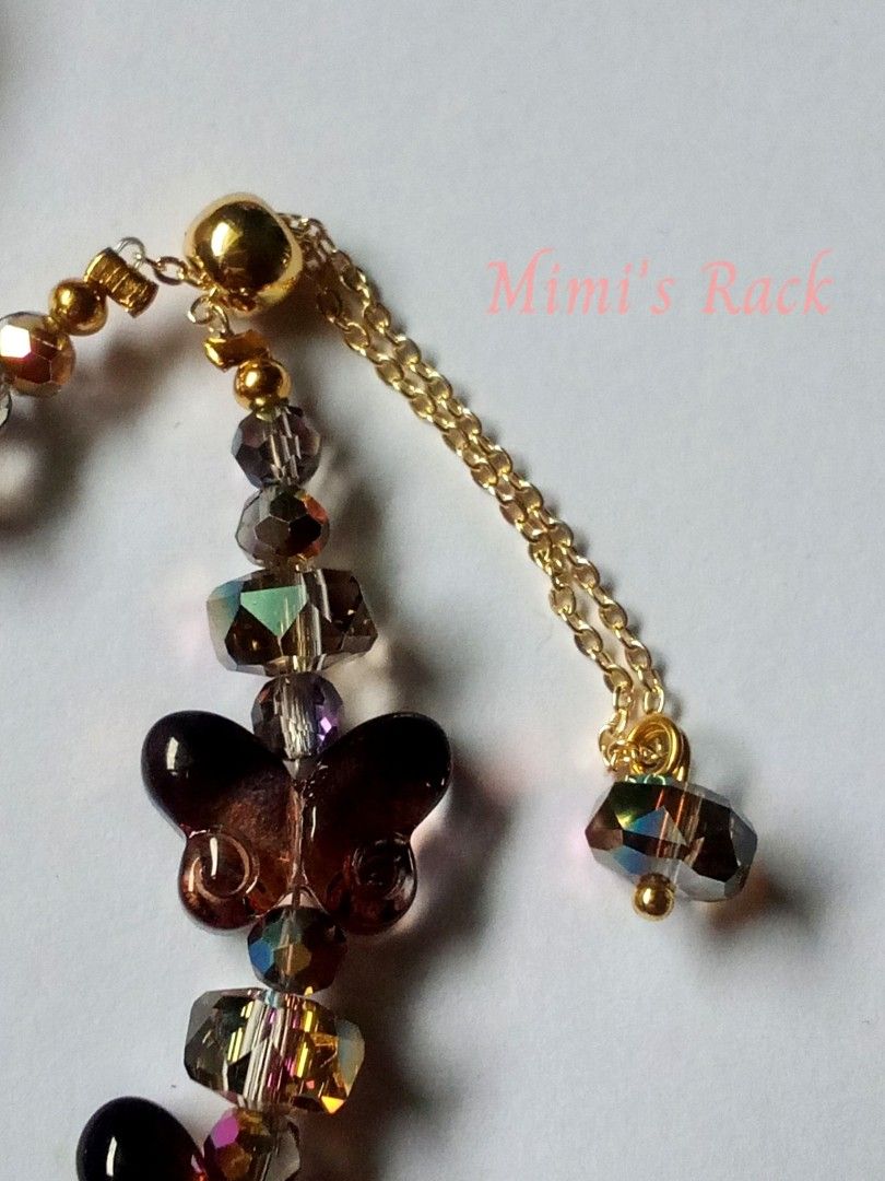 Black Butterfly Crystal Charm Bracelet (Category: Bracelets) located in Taguig. Submitted by mimisrack (Listing ID 1459629337, Image 3). Description: 🖤A beautiful and eye-catching black butterfly bracelet featuring glossy butterfly charms paired with sparkling faceted crystal beads. -The crystals reflect gorgeous champagne, pink, and rainbow-like flashes as they catch the light. ✨ -A lovely piece for everyday wear, special occasions, or as a cut