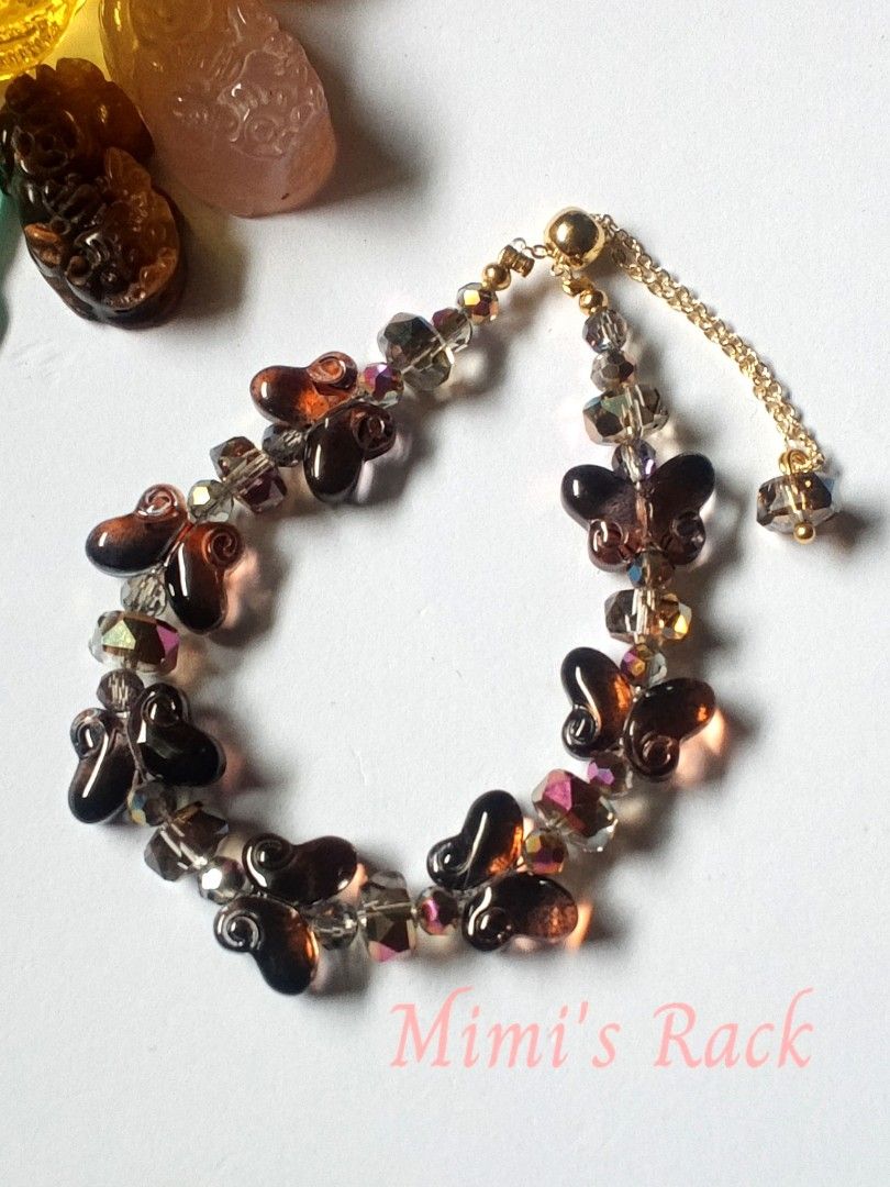 Black Butterfly Crystal Charm Bracelet (Category: Bracelets) located in Taguig. Submitted by mimisrack (Listing ID 1459629337, Image 1). Description: 🖤A beautiful and eye-catching black butterfly bracelet featuring glossy butterfly charms paired with sparkling faceted crystal beads. -The crystals reflect gorgeous champagne, pink, and rainbow-like flashes as they catch the light. ✨ -A lovely piece for everyday wear, special occasions, or as a cut