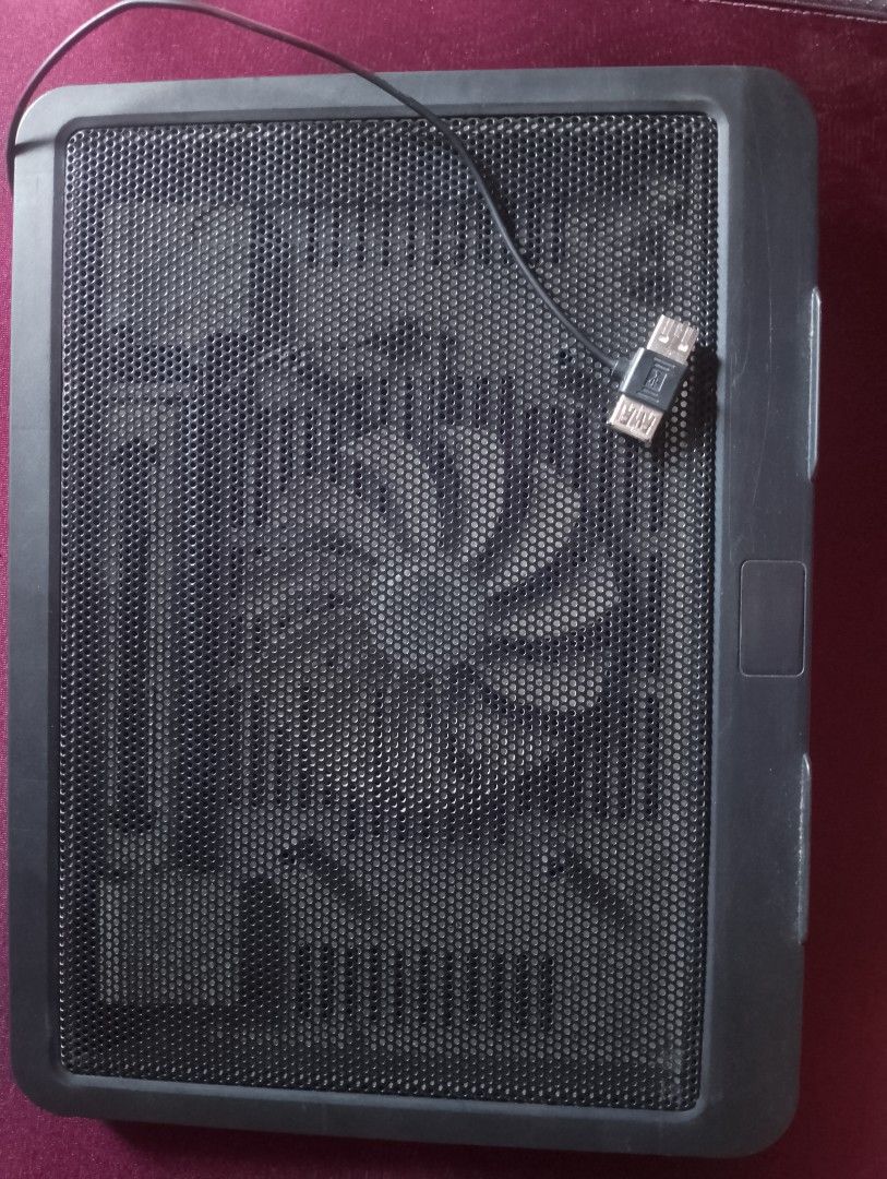 Black Laptop Cooling Pad with Fan (Category: Laptops & Notebooks) located in Manila. Submitted by paul281 (Listing ID 1459545483, Image 2). Description: - Black laptop cooling pad - Built-in USB-powered fan for effective cooling - Mesh surface for optimal airflow - Standard size, fits most laptops - Ideal for gaming and extended work sessions.
