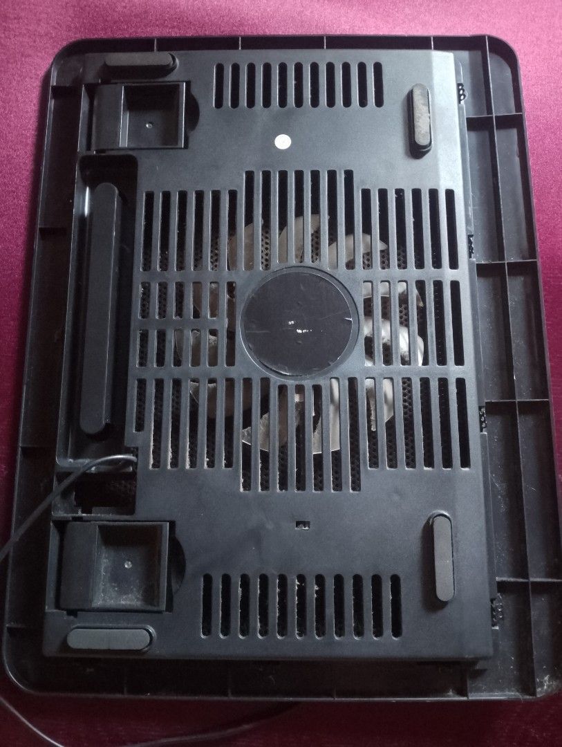 Black Laptop Cooling Pad with Fan (Category: Laptops & Notebooks) located in Manila. Submitted by paul281 (Listing ID 1459545483, Image 1). Description: - Black laptop cooling pad - Built-in USB-powered fan for effective cooling - Mesh surface for optimal airflow - Standard size, fits most laptops - Ideal for gaming and extended work sessions.