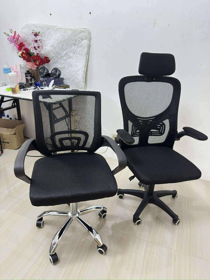 Black Mesh Ergonomic Office Chairs with Headrest p (Category: Office Furniture & Fixtures) located in Manila. Submitted by omsiminingiri3122 (Listing ID 1459511331, Image 1). Description: - One chair features a headrest and adjustable armrests - Both chairs have a swivel base with wheels for easy mobility - Comfortable and breathable mesh design - Ideal for home office or study setup - Available for purchase as a pair or individually - Message fo