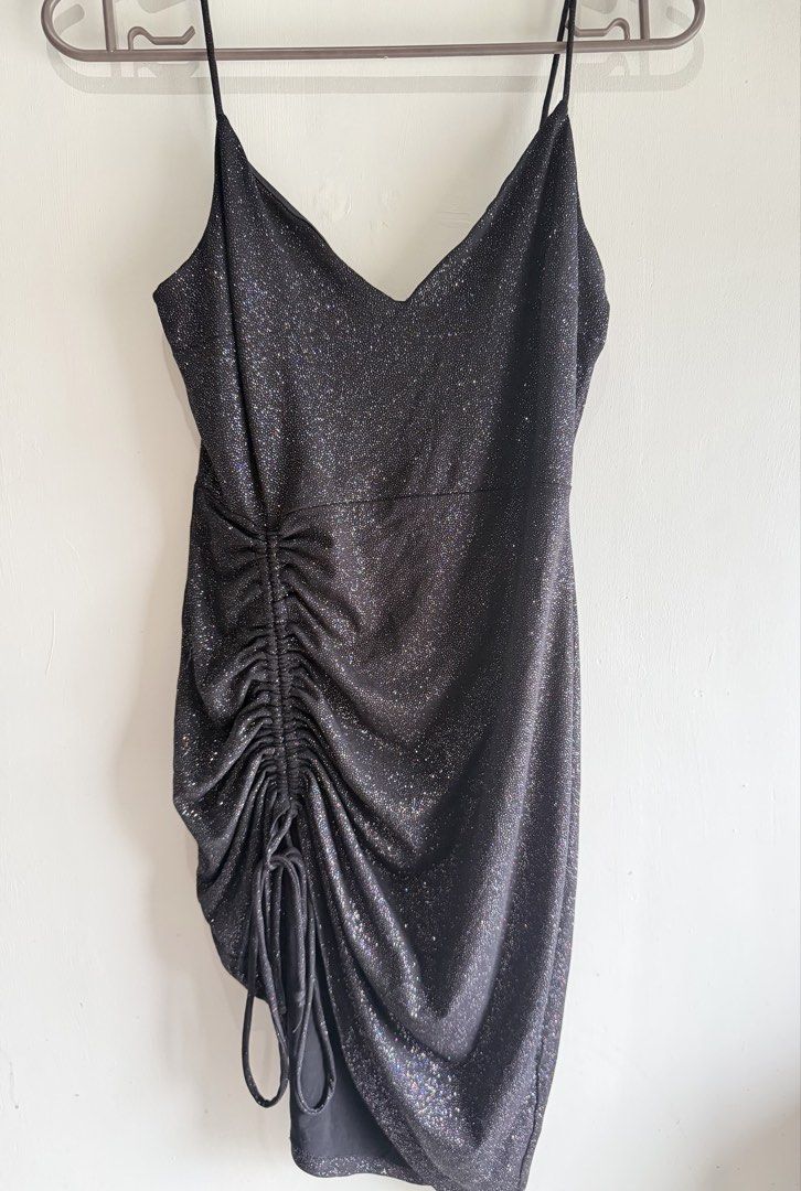 Black sparkly side-ruched sexy dress (Category: Dresses) located in Manila. Submitted by bag_finder (Listing ID 1459548010, Image 1). Description: 🖤black sparkly mini dress featuring an adjustable side-ruched drawstring detail RFS: decluttering, price negotiable.