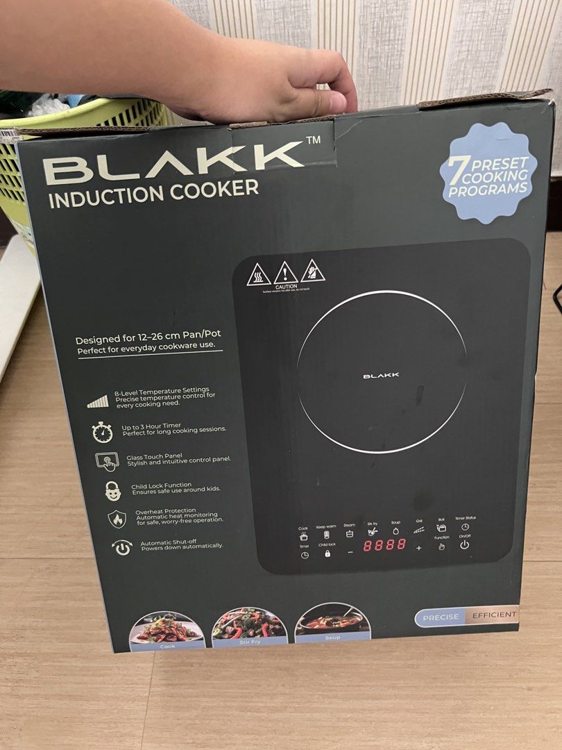 BLAKK Induction Cooker with 7 Preset Cooking Programs (Category: Cookers) located in Manila. Submitted by buenaventu09221 (Listing ID 1459551685, Image 2). Description: - BLAKK Induction Cooker - Suitable for 12-26cm pans/pots - 7 preset cooking programs - 5-level temperature settings - Sleek glass touch panel - Safety features: Child lock & overheat protection - Auto shut-off function - Ideal for daily cooking needs.