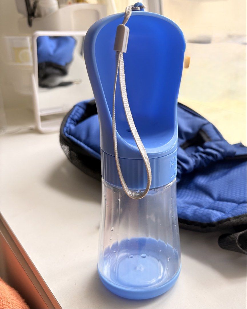 (SET) Blue Pet Carrier Backpack with Portable Water Bottle (Category: Homes & Other Pet Accessories) located in Manila. Submitted by biakaruuu (Listing ID 1459672853, Image 3). Description: - Blue pet carrier backpack - Mesh sides for excellent ventilation - Adjustable straps for a comfortable fit - Comes with a blue portable pet water bottle - Ideal for walks, travel, and everyday outings - Easy to clean and maintain - Bought carrier for 600+, B