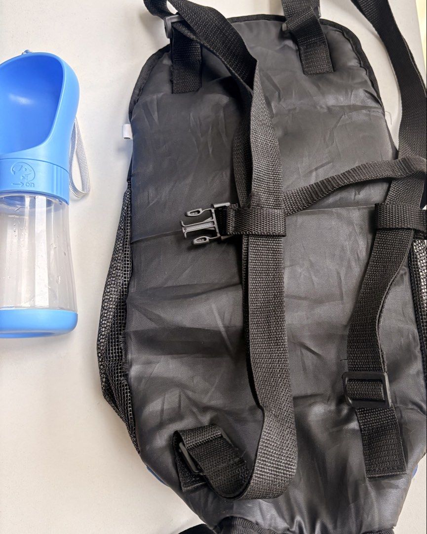 (SET) Blue Pet Carrier Backpack with Portable Water Bottle (Category: Homes & Other Pet Accessories) located in Manila. Submitted by biakaruuu (Listing ID 1459672853, Image 2). Description: - Blue pet carrier backpack - Mesh sides for excellent ventilation - Adjustable straps for a comfortable fit - Comes with a blue portable pet water bottle - Ideal for walks, travel, and everyday outings - Easy to clean and maintain - Bought carrier for 600+, B