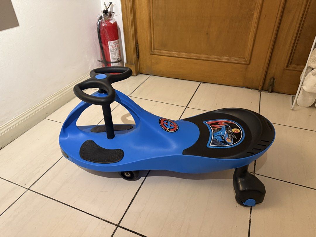 Blue Ride-On Swing Car with Decals (Category: Kids Toys) located in Makati City. Submitted by nemkd (Listing ID 1459525299, Image 1). Description: - Fun blue ride-on car for kids - Features cool decals on the seat - Easy to swing and steer - Great for indoor and outdoor play - Sturdy plastic construction - Ready for new adventures!.
