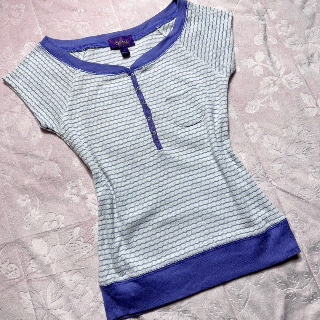 BNN Striped Henley Top (Category: Shirts) located in San Fernando. Submitted by rianne_von (Listing ID 1459613992, Image 2). Description: Size L on tag W: 13.3 in L: 21 in info: ✧ light blue fitted top w/ all-over purple micro-stripe detailing ✧ contrast purple trim w/ snap-button henley neckline + mini chest pocket ✧ excellent thrifted condition; no holes, stains, or major flaws observed ✧ color may vary slightly due to lighting .