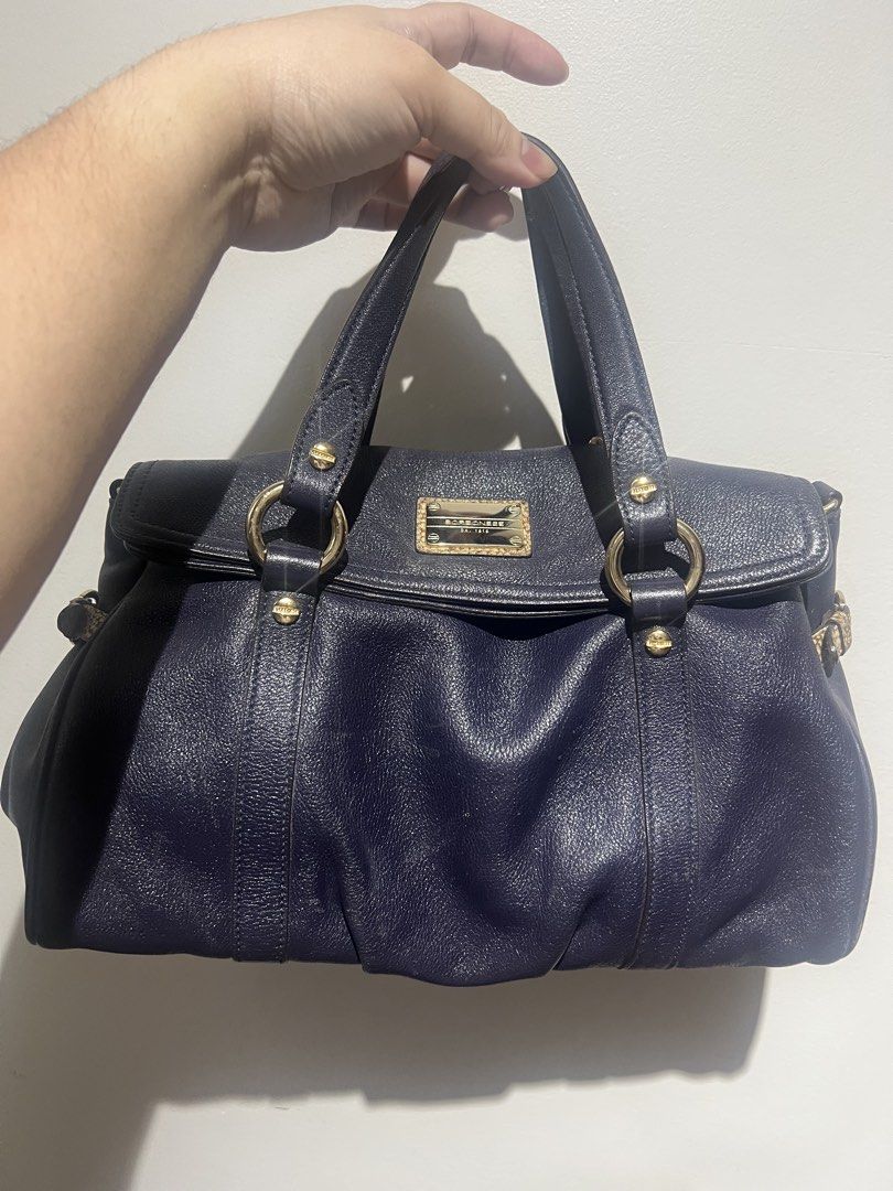 Borbonese Navy Leather Satchel Handbag (Category: Luxury Bags & Wallets) located in Santa Rosa. Submitted by pepperchill (Listing ID 1459676939, Image 1). Description: - Brand: Borbonese - Color: Navy Blue - Material: Leather - Hardware: Gold-tone - Features: Top handles, spacious interior.