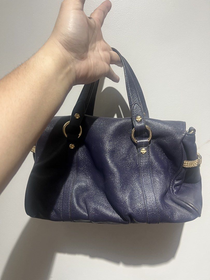 Borbonese Navy Leather Satchel Handbag (Category: Luxury Bags & Wallets) located in Santa Rosa. Submitted by pepperchill (Listing ID 1459676939, Image 2). Description: - Brand: Borbonese - Color: Navy Blue - Material: Leather - Hardware: Gold-tone - Features: Top handles, spacious interior.