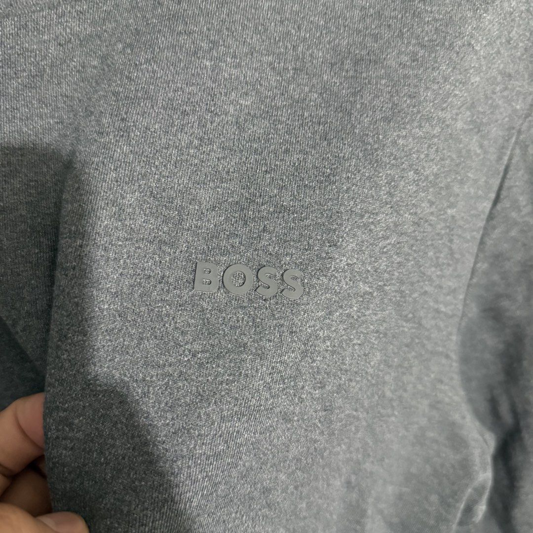 BOSS Grey Crewneck Sweatshirt Size L (Category: Coats, Jackets and Outerwear) located in Manila. Submitted by preciousma24494 (Listing ID 1459588812, Image 3). Description: - Grey BOSS sweatshirt Size: Large 21/26 - Crewneck style with long sleeves - Subtle BOSS logo embroidered on the chest - Comfortable and classic design - Ideal for layering or wearing solo - Perfect for everyday casual outfits.