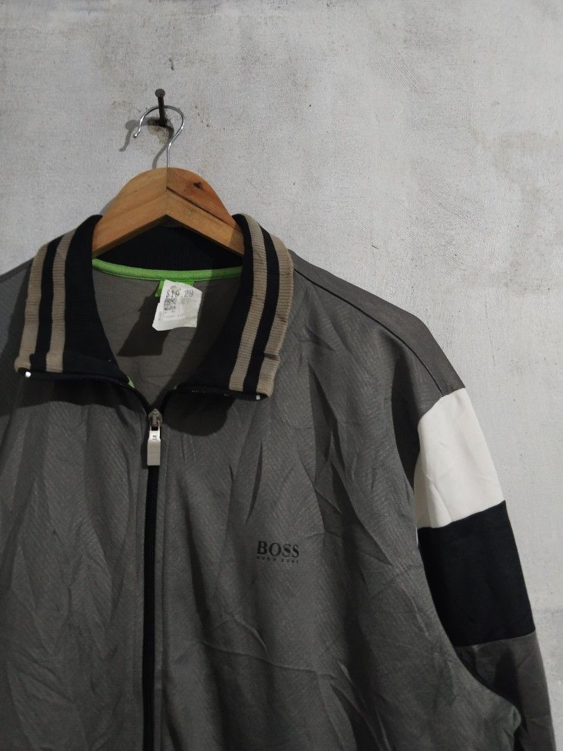 BOSS Track Jacket Grey Black White Colorblock (Category: Coats, Jackets and Outerwear) located in Tabaco. Submitted by strain_finds (Listing ID 1459621880, Image 3). Description: - BOSS track jacket - Color: Grey with black and white colorblock sleeves - Features: Full zip front, zippered pockets - Details: Ribbed collar, cuffs, and hem - Ideal for: Casual wear or light workouts.