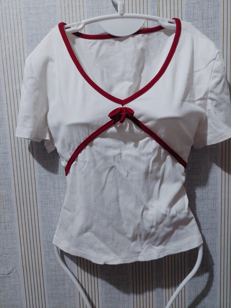 Bow Tie Fitted Short Sleeve (White) (Category: Blouses) located in Tarlac. Submitted by prelovedtarlac22 (Listing ID 1459637107, Image 2). Description: Bow Tie Fitted Short Sleeve White - Size Large on tag, but best fit is Medium - Stretchable RFS: Decluttering my closet ❤️ 📍Tarlac based - No COD (Payment First) to avoid being scammed - Shipping fee will be shouldered by the buyer - Once the payment has been received, we will ship the item immed