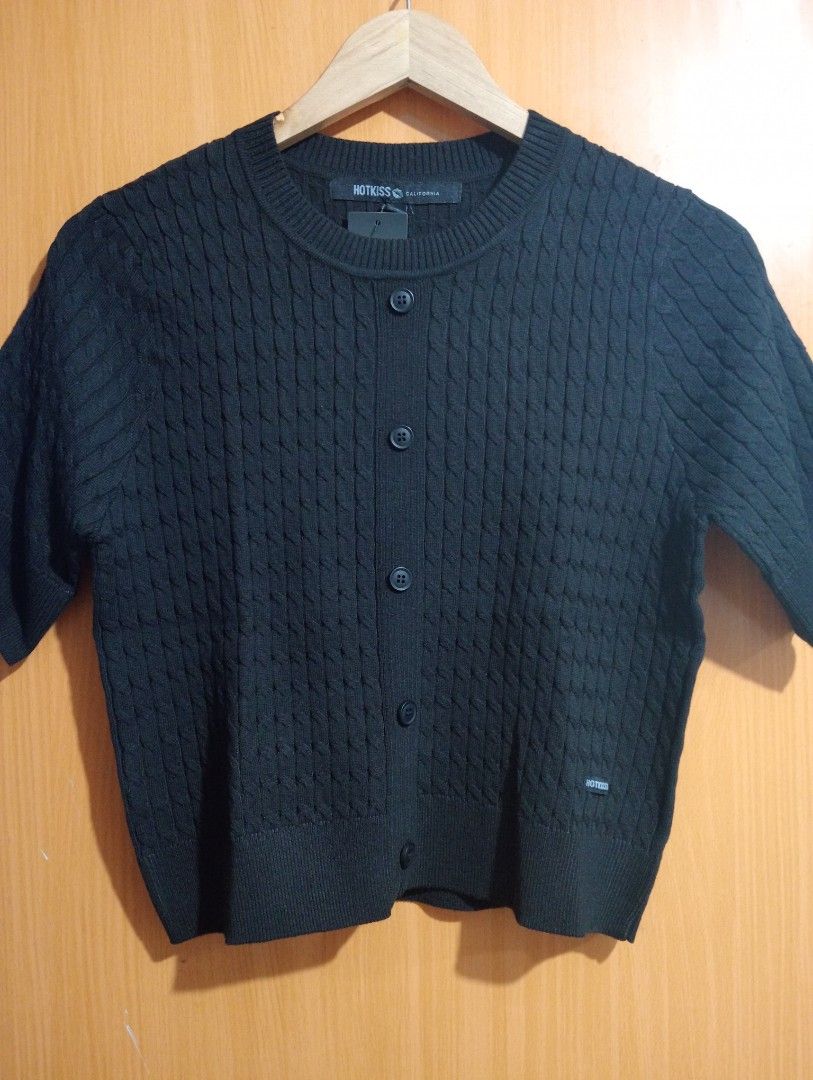 BRAND NEW Black Cable Knit Button Top (Category: Blouses) located in Manila. Submitted by cenasells (Listing ID 1459623592, Image 3). Description: Brand new with hangtag Size : Small ( fit to small - med ) Color : Black Fabric : cotton knit.