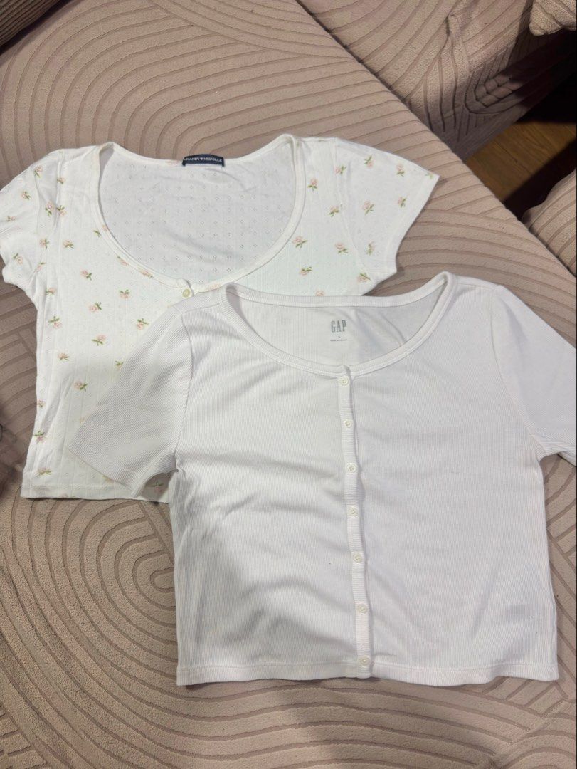 Brandy Melville + GAP Short-Sleeve Button-Downs (Category: Blouses) located in Manila. Submitted by shentrendsph (Listing ID 1459607890, Image 2). Description: ✨ GET BOTH FOR ONLY ₱550! ✨ • Brandy Melville short-sleeve button-down • GAP short-sleeve button-down • Fits Small to Medium • Both are easy-to-style wardrobe staples! 💰 ₱550 for the 2 pieces Perfect for casual, or everyday looks. Grab both for a steal! 🛍️.
