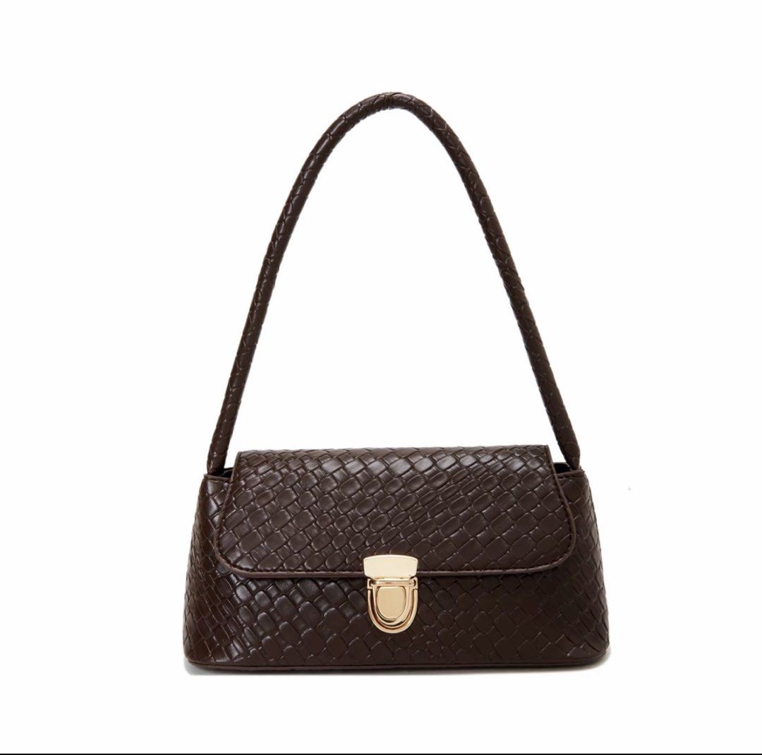Brown Woven Shoulder Bag with Gold Clasp (Category: Shoulder Bags) located in General Trias. Submitted by noblefalcon_f5ea8d (Listing ID 1459516970, Image 1). Description: - Cute brown shoulder bag - All-over woven texture - Braided strap - Gold clasp closure on front flap - Ideal for everyday or night out - Fits essentials.