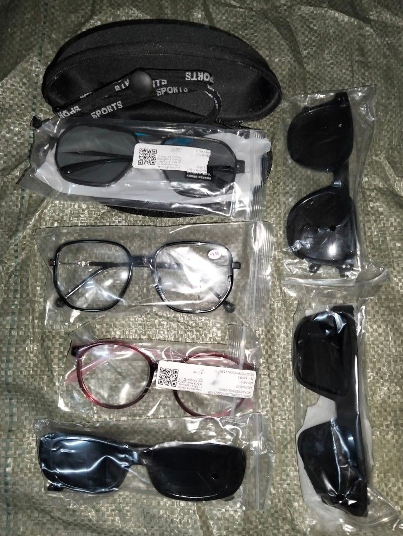 Bundle 6pcs Sunglasses Clip-on Eyeglasses Set with Case (Category: Sunglasses & Eyewear) located in Caloocan City. Submitted by girlshopmcollection (Listing ID 1459492873, Image 1). Description: - Complete eyeglasses set with interchangeable clip-on sunglasses. - Includes clear lenses for everyday wear. - Features stylish red-rimmed frames. - Comes with dark polarized clip-on lenses for sun protection. - Ideal for various lighting conditions and 