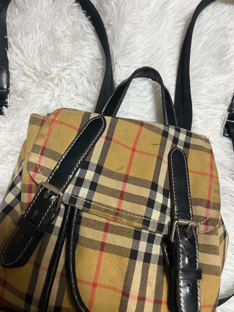 Burberry Vintage Check Nylon Rucksack (Backpack) (Category: Backpacks) located in Manila. Submitted by senggggg. (Listing ID 1459663666, Image 3). Description: good condition working zip sign of use need wash minimal dirt check details and size.