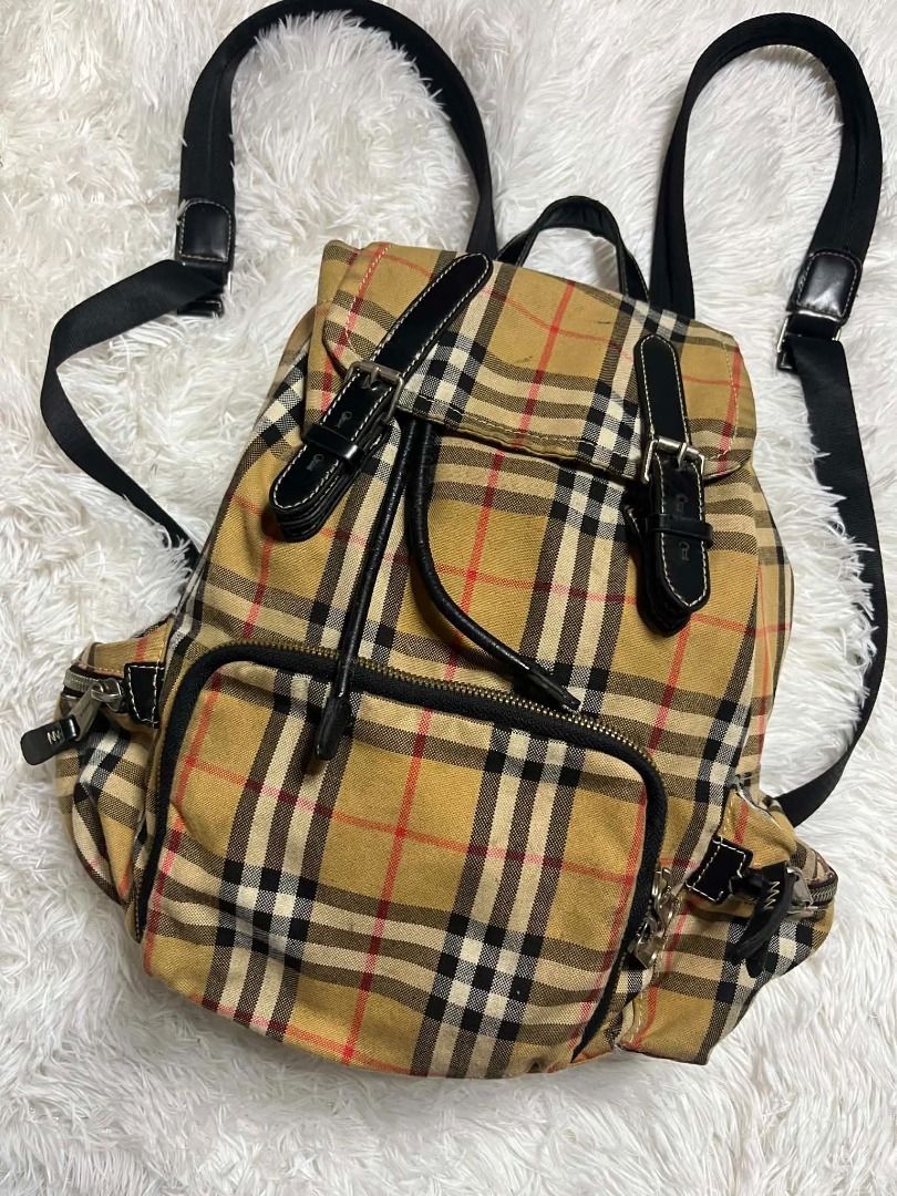Burberry Vintage Check Nylon Rucksack (Backpack) (Category: Backpacks) located in Manila. Submitted by senggggg. (Listing ID 1459663666, Image 2). Description: good condition working zip sign of use need wash minimal dirt check details and size.