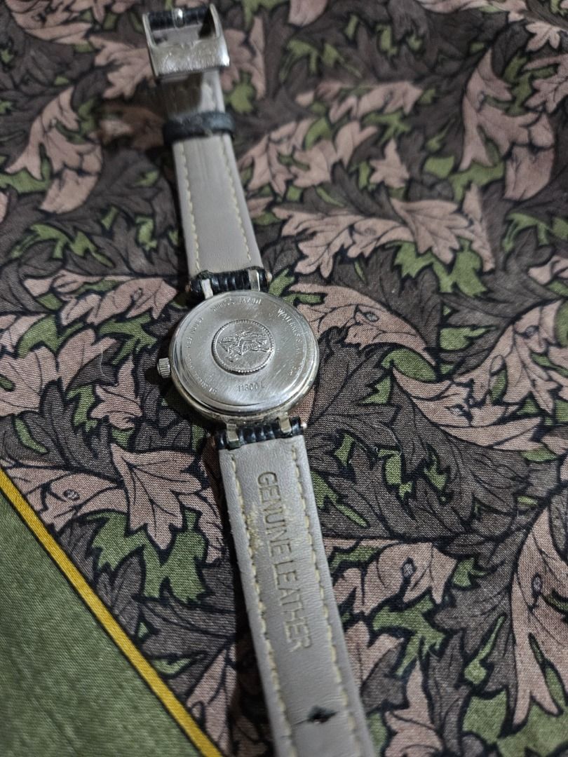 Burberry watch with date window, 25 mm, quartz (Category: Women's Watches) located in Baguio. Submitted by kaipldn (Listing ID 1459598129, Image 3). Description: -Burberry quartz watch with date window, 25mm -Original leather and buckles -Bought in 2022 from a Carousell seller, originally bought for 9.8k -Battery is not working, needs replacing, so selling low.