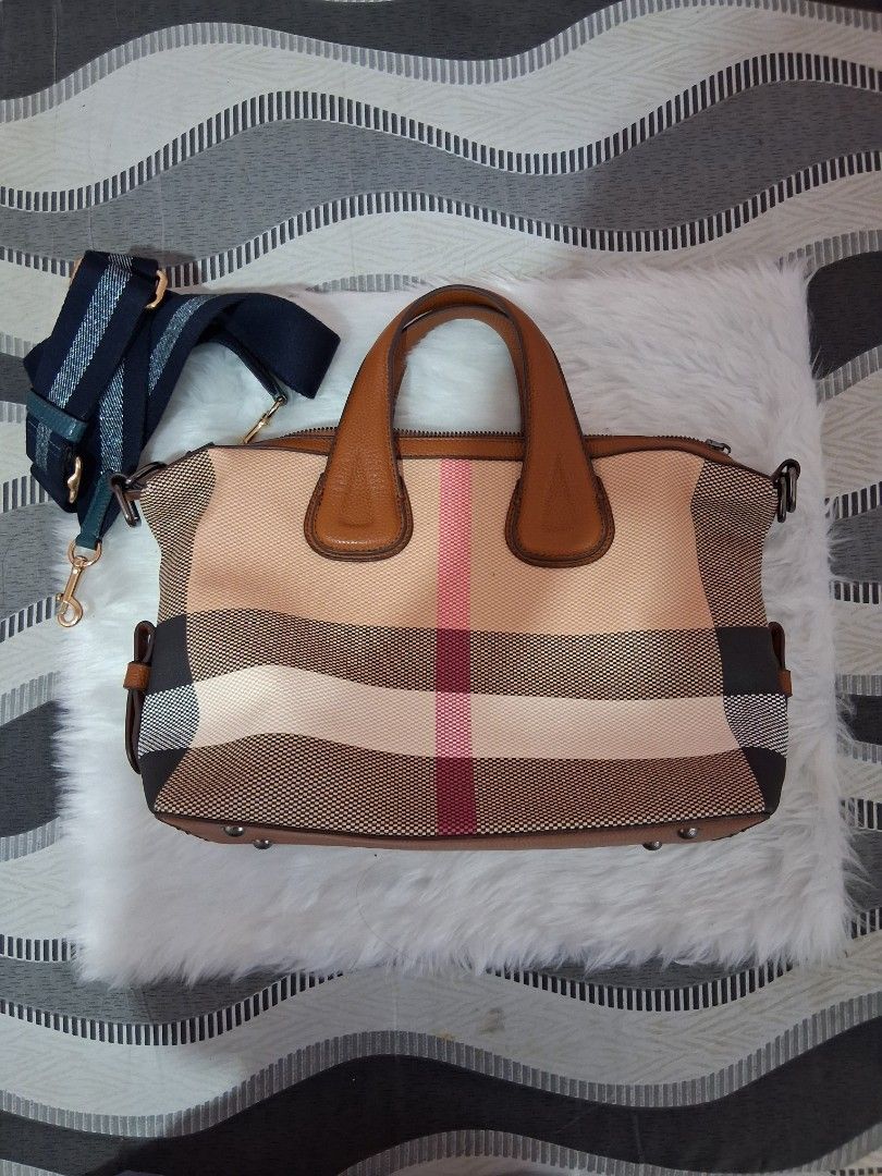 Burberry-style Plaid Handbag with Shoulder Strap (Category: Luxury Bags & Wallets) located in Bulacan. Submitted by lexxx2 (Listing ID 1459540373, Image 1). Description: - Classic plaid design - Tan leather trim and handles - Secure zipper closure - Multiple interior compartments - Interior zippered pocket - Detachable shoulder strap included - Ideal for everyday use - Made in China.