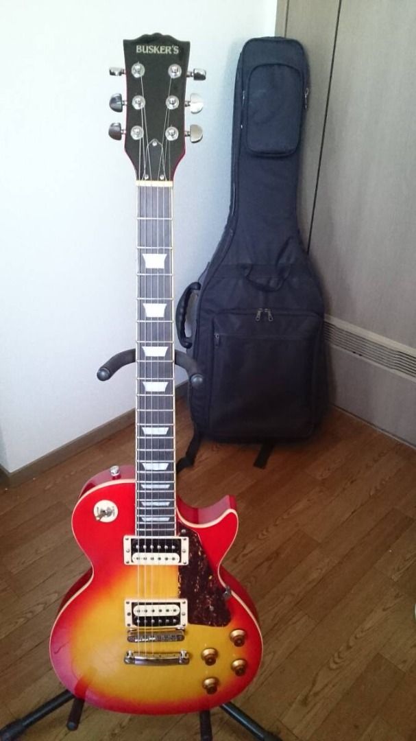 Buskers Les Paul Electric Guitar (Category: Musical Instruments) located in Caloocan City. Submitted by chuyla (Listing ID 1459642258, Image 1). Description: Buskers Les Paul Cherry Burst. Excellent condition. Pwedeng pwede sa maselan. From japan. PM for inquiries. .