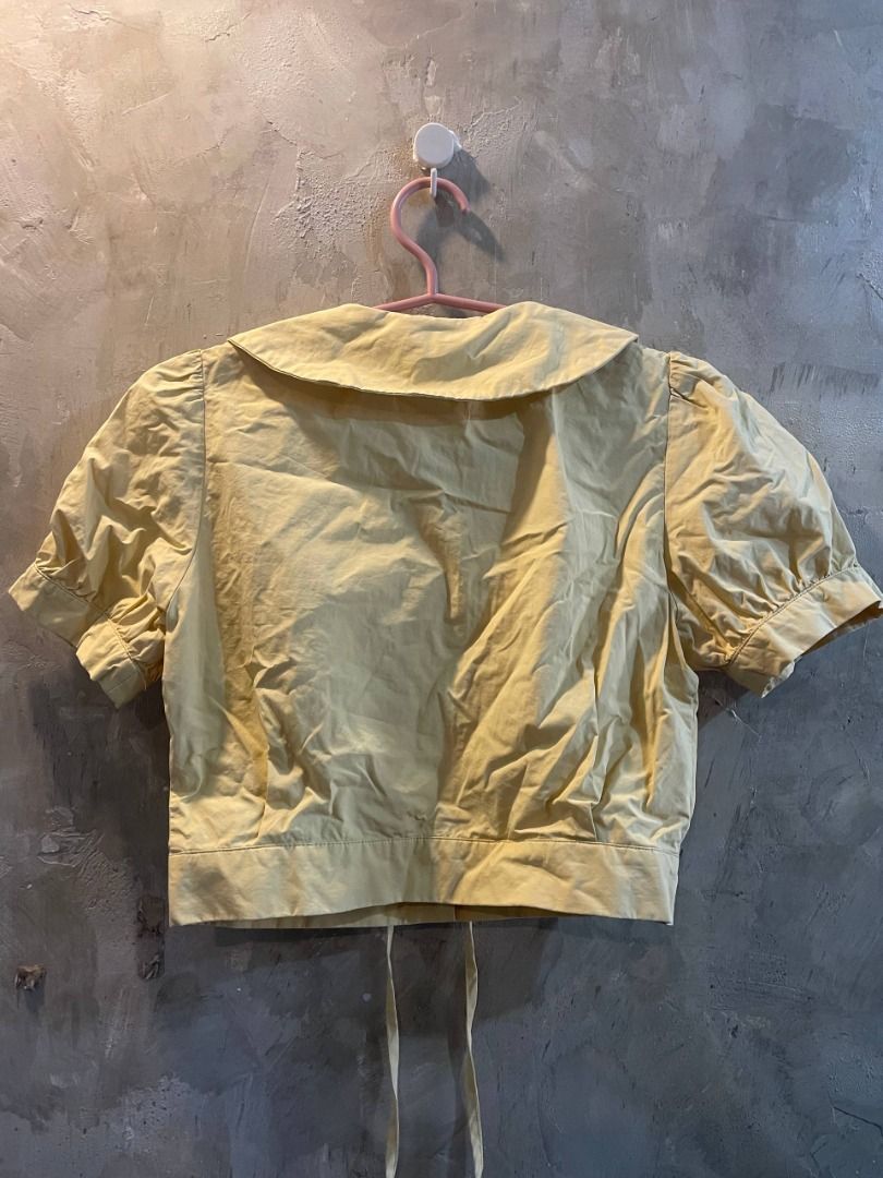 Butter Yellow Puff-Sleeve Cropped Blouse (Category: Blouses) located in Cavite. Submitted by topcheers (Listing ID 1459547690, Image 2). Description: 🌼 Butter Yellow Puff-Sleeve Cropped Blouse 🌼 📏 Size: Small ✅ Condition: 9/10 – Good Condition ✨ Details: Sweet butter yellow blouse in a soft, crisp fabric — fresh and cheerful for any casual day Oversized wide lapel collar (sailor/Peter Pan-inspired) for a charming, vintage-cute aesthetic Dainty