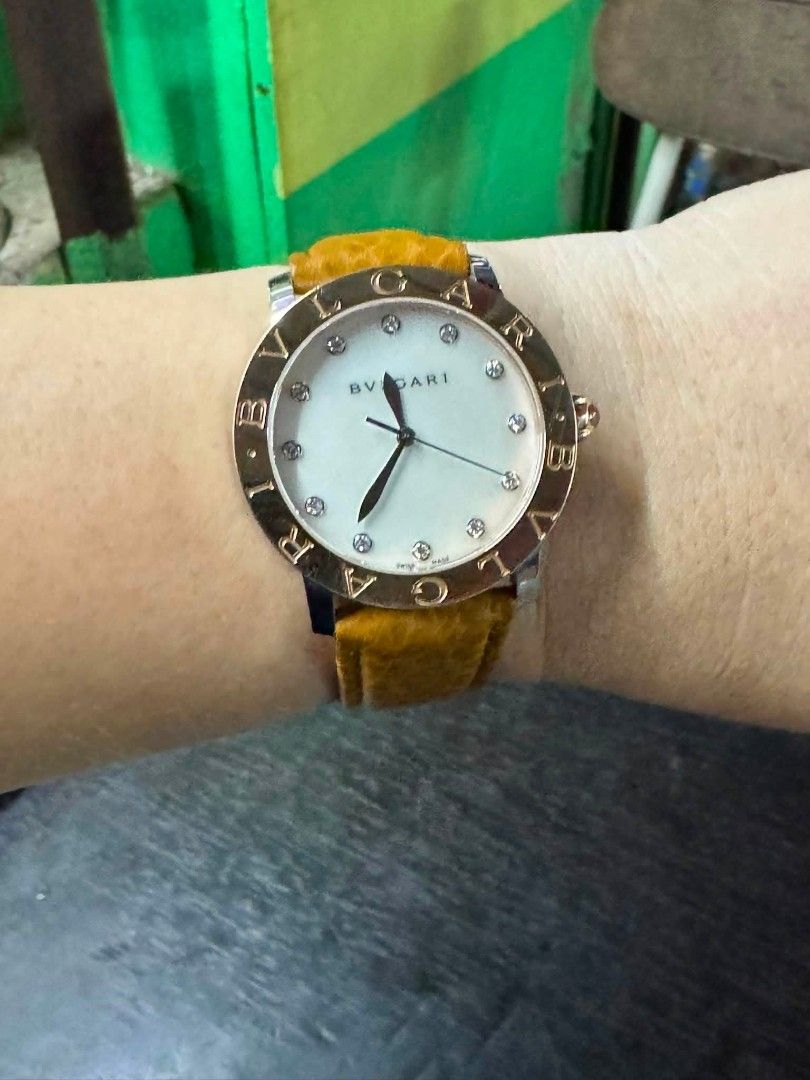 BVLGARI 18K Gold Bezel Diamond Watch (Category: Luxury Watches) located in Daet. Submitted by jemotovlog28 (Listing ID 1459622735, Image 2). Description: - Authentic Bvlgari Watch - Model: BBL P 37 SG - Dial: Mother-of-pearl with diamond hour markers - Bezel: Rose gold - Case: Stainless steel - Strap: Tan leather - Movement: Swiss-made - Versatile for any occasion.