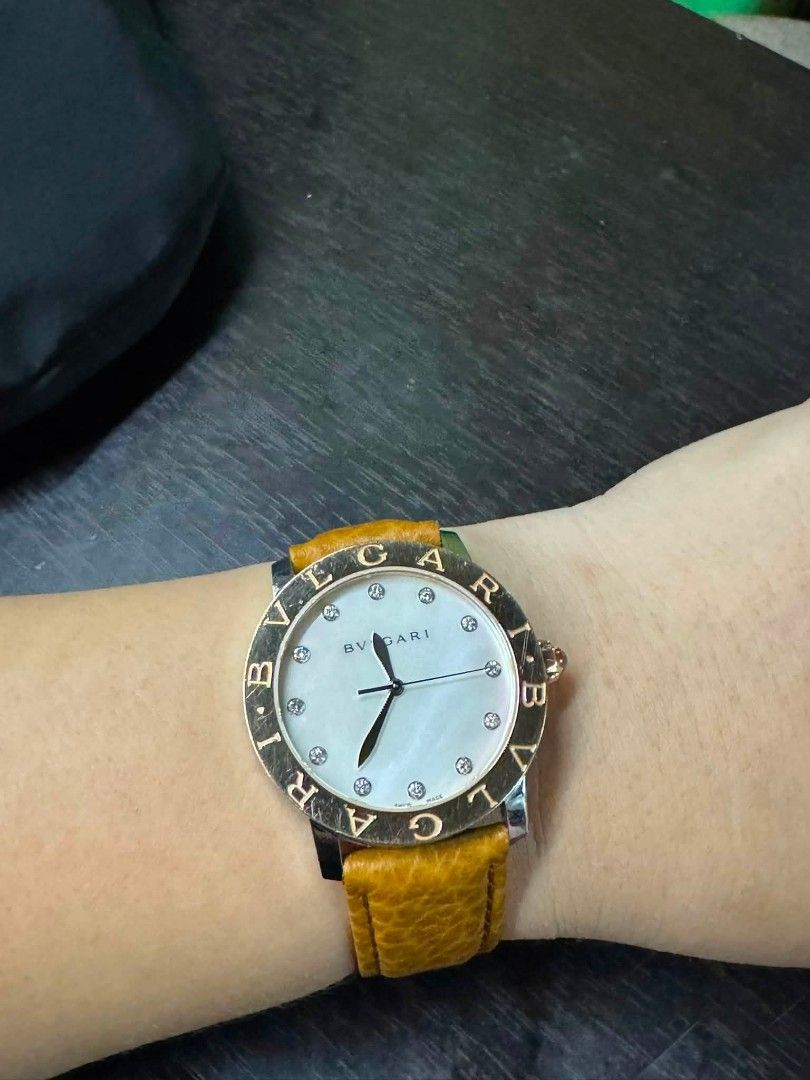 BVLGARI 18K Gold Bezel Diamond Watch (Category: Luxury Watches) located in Daet. Submitted by jemotovlog28 (Listing ID 1459622735, Image 1). Description: - Authentic Bvlgari Watch - Model: BBL P 37 SG - Dial: Mother-of-pearl with diamond hour markers - Bezel: Rose gold - Case: Stainless steel - Strap: Tan leather - Movement: Swiss-made - Versatile for any occasion.
