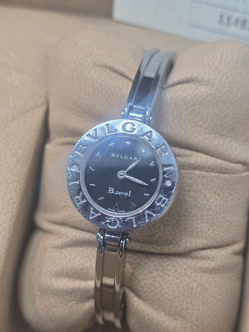 Bvlgari B.zero1 Black Dial Ladies' Watch (Category: Luxury Watches) located in Taguig. Submitted by mluxeph (Listing ID 1459533379, Image 3). Description: Bvlgari B.zero1 Black Dial Ladies' Watch Gender: Ladies Reference #: BZ 22 S Movement: Quartz Case Size: 22mm Case Material: Stainless Steel Strap Size: 7” / 8” (with face) Crystal: Sapphire Water Resistance: 30m Dial Type/Color: Analog / Black Calendar: None Band Type: Bangle Band Material: St
