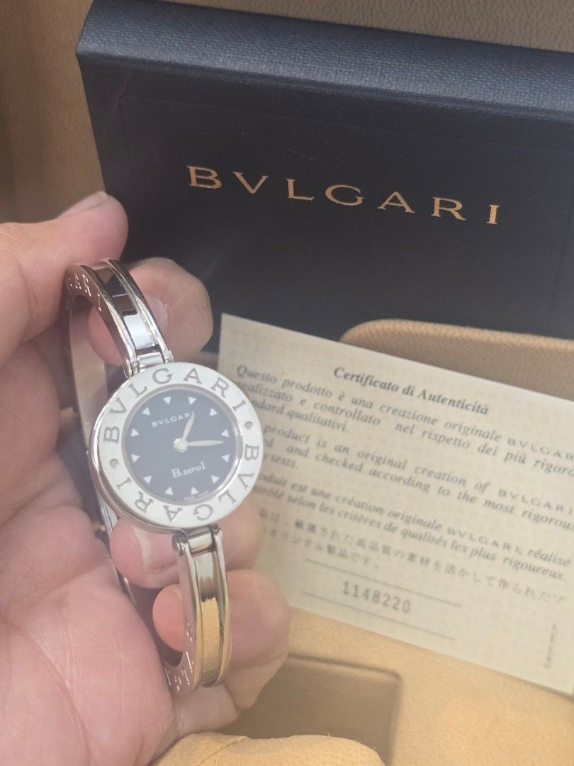 Bvlgari B.zero1 Black Dial Ladies' Watch (Category: Luxury Watches) located in Taguig. Submitted by mluxeph (Listing ID 1459533379, Image 1). Description: Bvlgari B.zero1 Black Dial Ladies' Watch Gender: Ladies Reference #: BZ 22 S Movement: Quartz Case Size: 22mm Case Material: Stainless Steel Strap Size: 7” / 8” (with face) Crystal: Sapphire Water Resistance: 30m Dial Type/Color: Analog / Black Calendar: None Band Type: Bangle Band Material: St