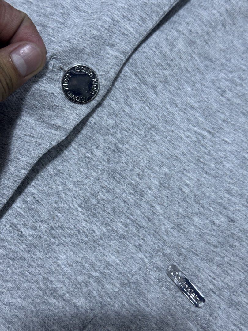 Calvin Klein Coat (Category: Coats, Jackets and Outerwear) located in Las Pinas. Submitted by rdcthriftedshop (Listing ID 1459599309, Image 3). Description: 📦 CALVIN KLEIN cotton coat Size Large on tag Width: 20 Length: 25 Color rate: 10/10 Condition: Good as new condition NO ISSUE .