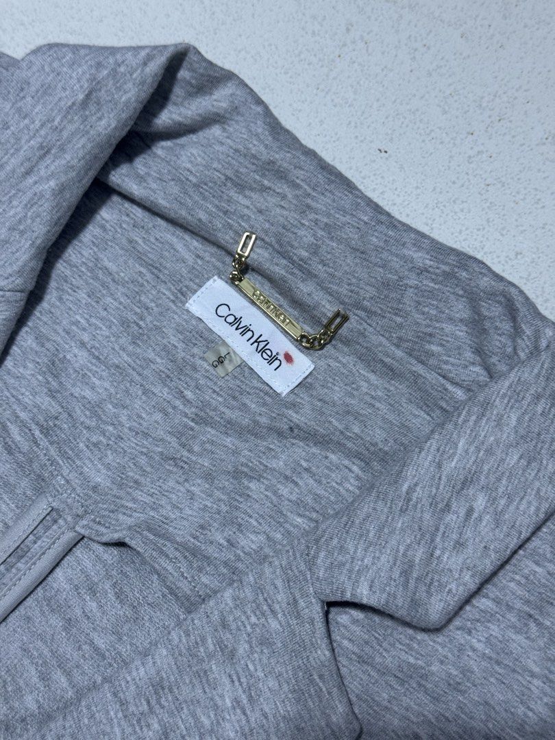 Calvin Klein Coat (Category: Coats, Jackets and Outerwear) located in Las Pinas. Submitted by rdcthriftedshop (Listing ID 1459599309, Image 2). Description: 📦 CALVIN KLEIN cotton coat Size Large on tag Width: 20 Length: 25 Color rate: 10/10 Condition: Good as new condition NO ISSUE .