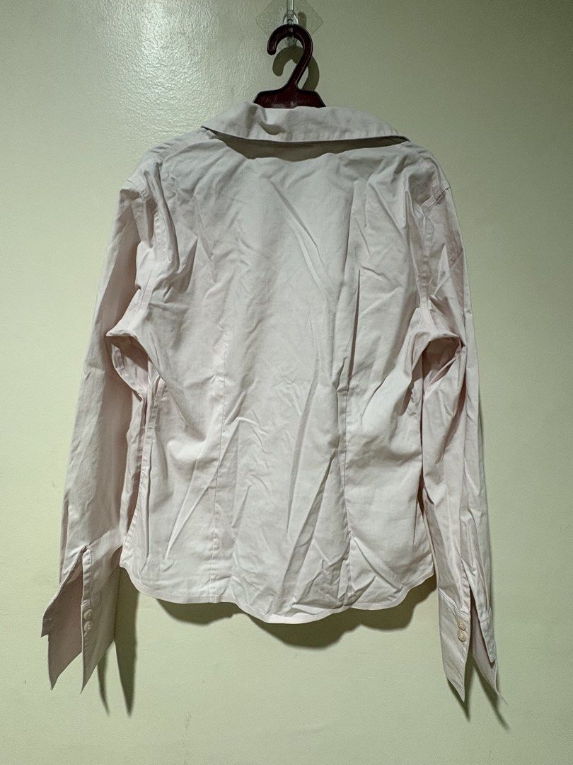Calvin Klein Non-Iron Pink Button-Up Blouse (Category: Blouses) located in Manila. Submitted by gabriellea00749 (Listing ID 1459649786, Image 3). Description: - Brand: Calvin Klein - Color: Pink - Style: Button-up blouse - Material: Non-iron (easy care) - Versatile: Suitable for work or casual outfits - Condition: Selling as is - Needs ironing - I haven’t worn this yet!!! - Message me for measurements -Price is still negotiable :).