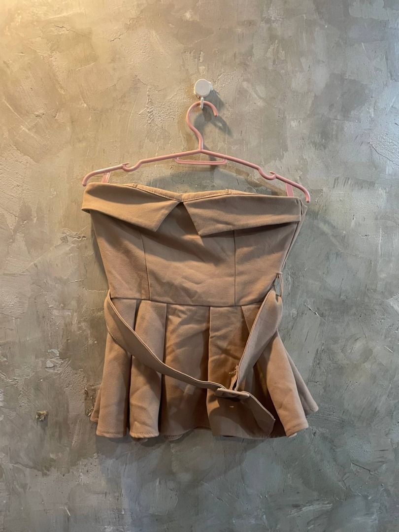 Camel Structured Strapless Peplum Top (Category: Others Tops) located in Cavite. Submitted by topcheers (Listing ID 1459548060, Image 3). Description: 🤎 Camel Structured Strapless Peplum Top 🤎 📏 Size: Small ✅ Condition: 9/10 – Good Condition ✨ Details: Rich camel/nude beige tone in a soft suede-like textured fabric, warm, earthy, and effortlessly chic Strapless structured bodice with a neatly folded/origami-style top edge for a sophisticated, 