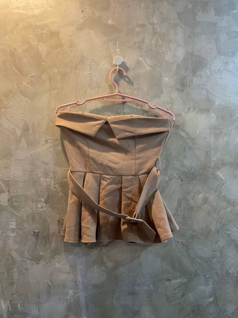 Camel Structured Strapless Peplum Top (Category: Others Tops) located in Cavite. Submitted by topcheers (Listing ID 1459548060, Image 2). Description: 🤎 Camel Structured Strapless Peplum Top 🤎 📏 Size: Small ✅ Condition: 9/10 – Good Condition ✨ Details: Rich camel/nude beige tone in a soft suede-like textured fabric, warm, earthy, and effortlessly chic Strapless structured bodice with a neatly folded/origami-style top edge for a sophisticated, 
